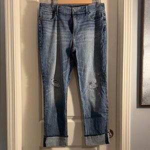 White House Black Market Blue Ankle Jeans with Sparkle behind distressed